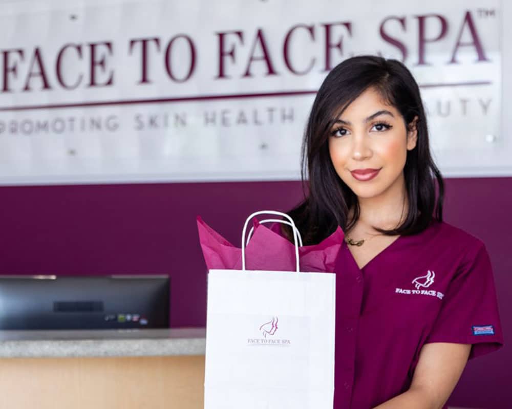 a woman holding a sign