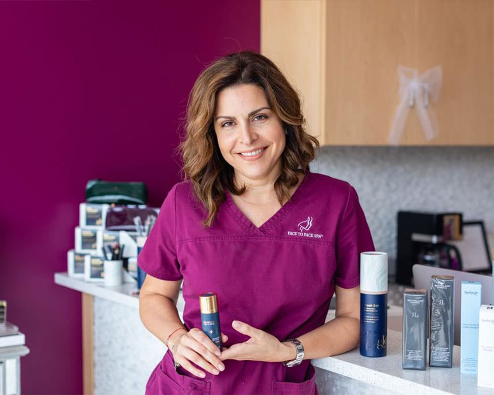 a person wearing a purple shirt