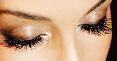 a close up of a womans face