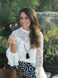 a woman smiling for the camera