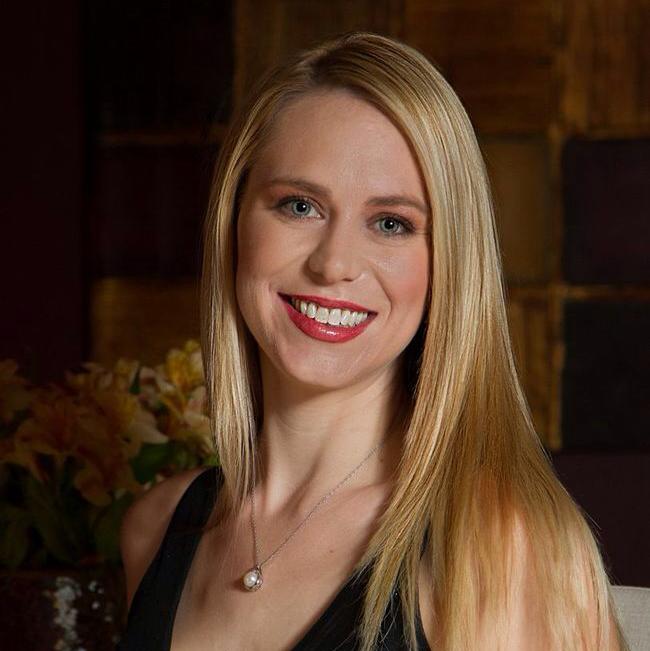 a woman smiling for the camera