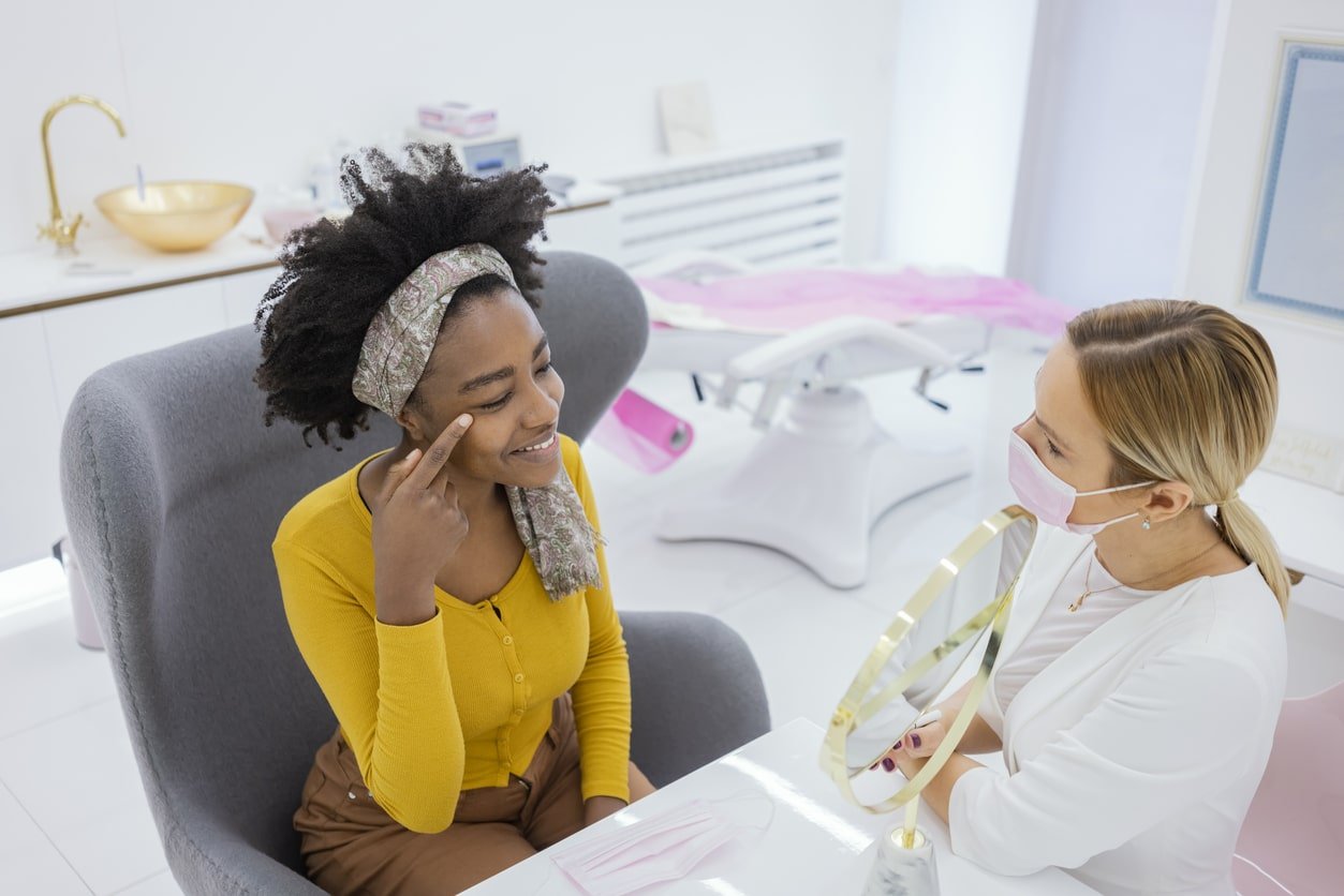 a woman sitting on a bed