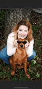 a person holding a dog