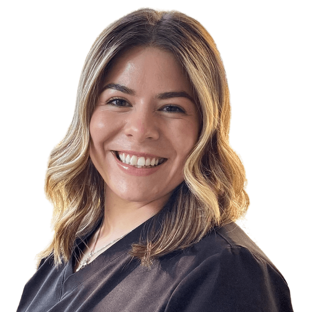 a person wearing glasses and smiling at the camera